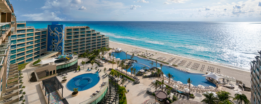Beautiful view of the swimming pool and the beach at the Hard Rock Hotel Cancun